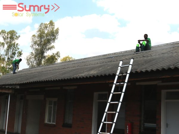 Installation of solar panels on top of the roof